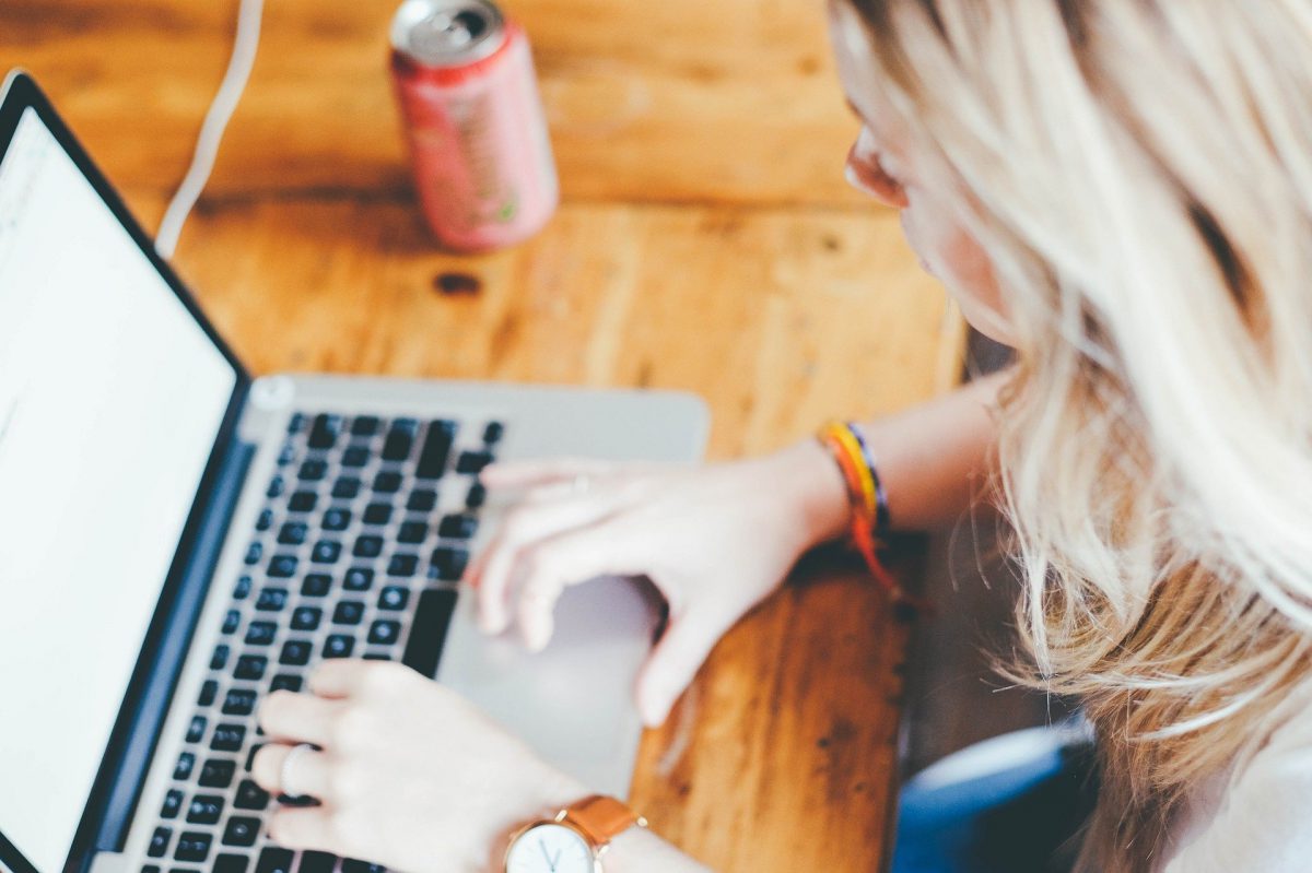 Woman behind computer working with TriFact365 accounting software